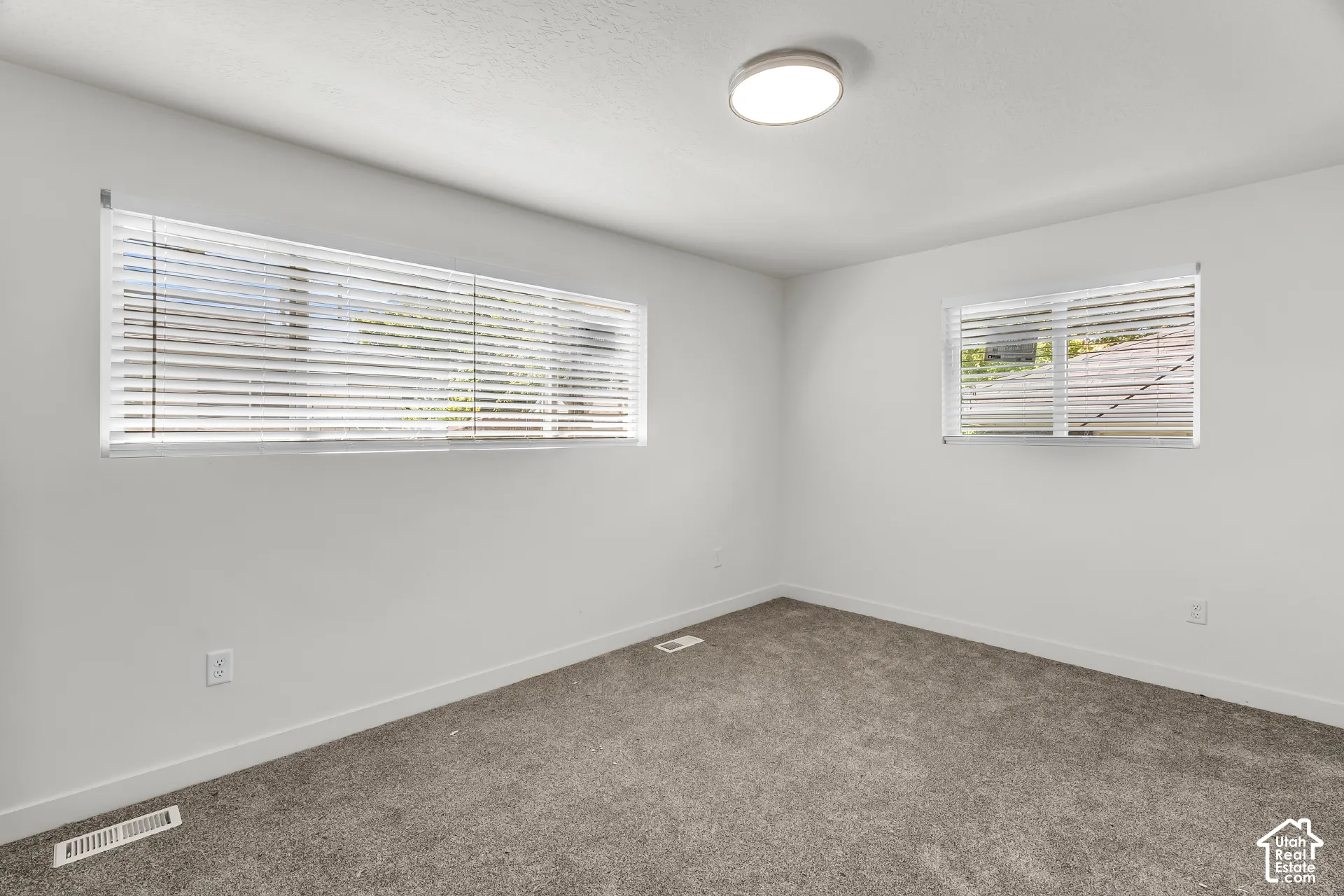 Recessed lighting fixture illuminating the space