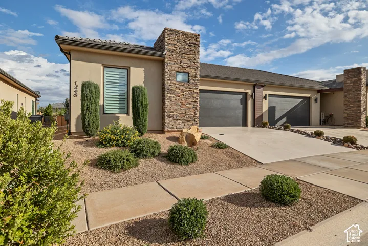 Stucco exterior with stacked stone accents
