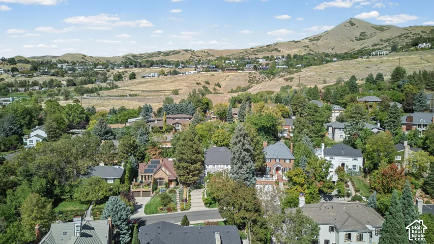 Residential neighborhood set against a mountainous backdrop