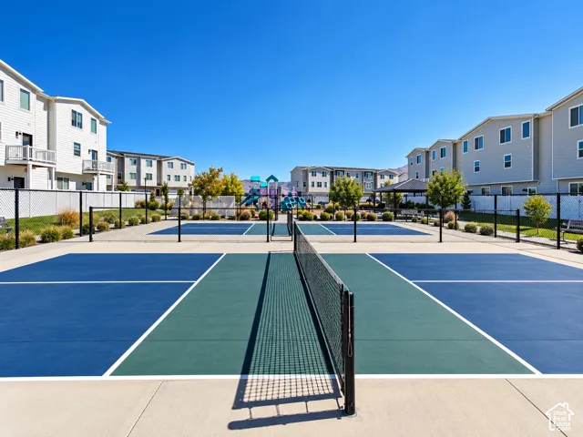 Multiple outdoor pickleball courts with durable surfacing