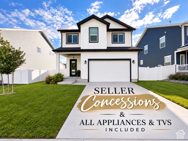 Two-story residence featuring white horizontal siding, contrasting dark window trim, an attached two-car garage, a covered front entryway, and a vinyl privacy fence