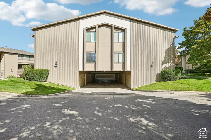 Neutral-toned exterior with vertical siding