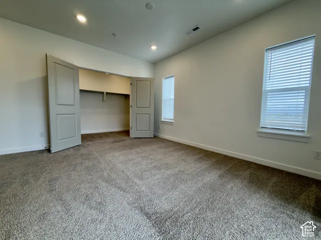 Primary bedroom with HUGE walk-in closet