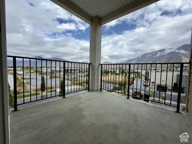 Large, private balcony off primary bedroom with mountain views all around