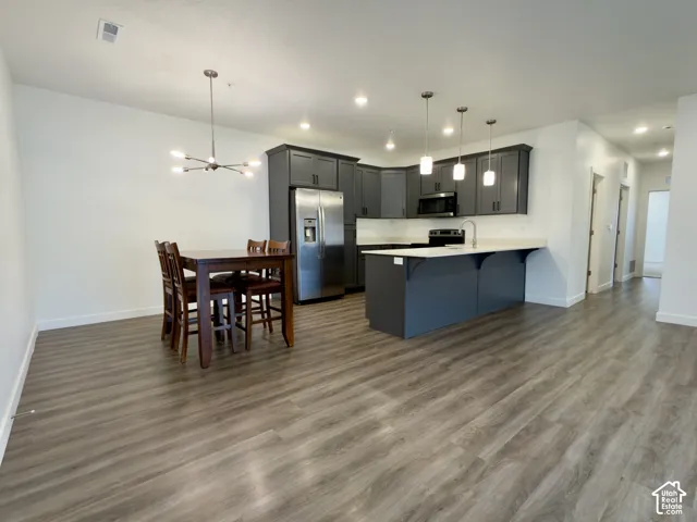 Large, open dining & kitchen areas with LVP flooring