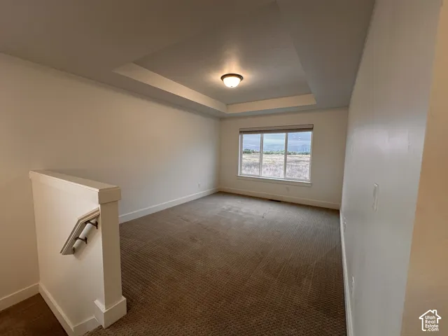 Recessed tray ceiling with a central flush-mount light fixture