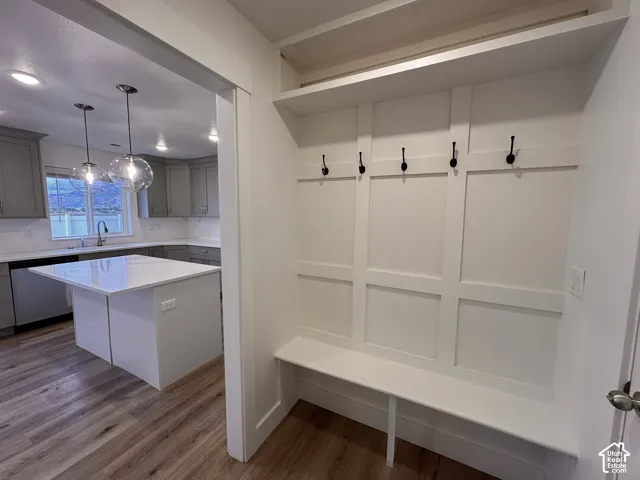 Built-in hall tree with bench seating and individual hooks
