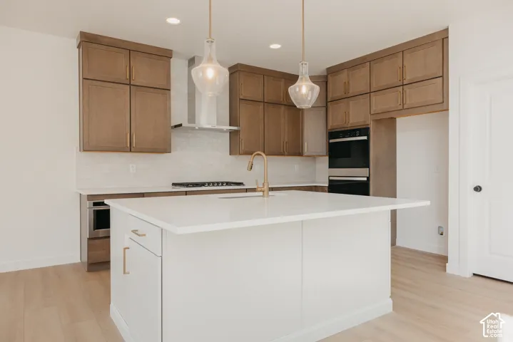 Large center island with a white countertop and integrated sink