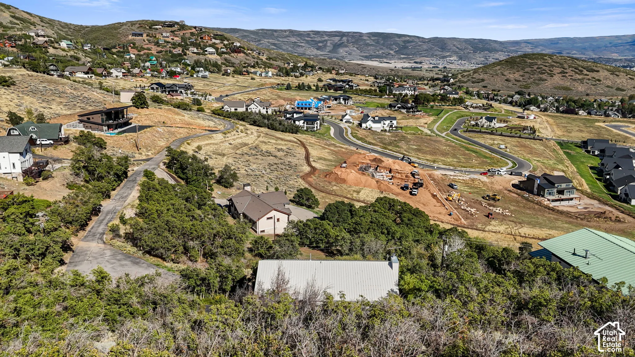 Hillsides with natural terrain and scattered trees