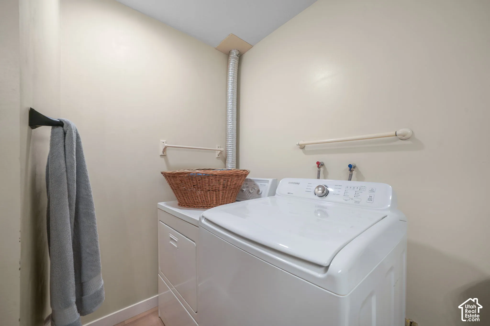 Dedicated laundry area inside Level 1 bathroom