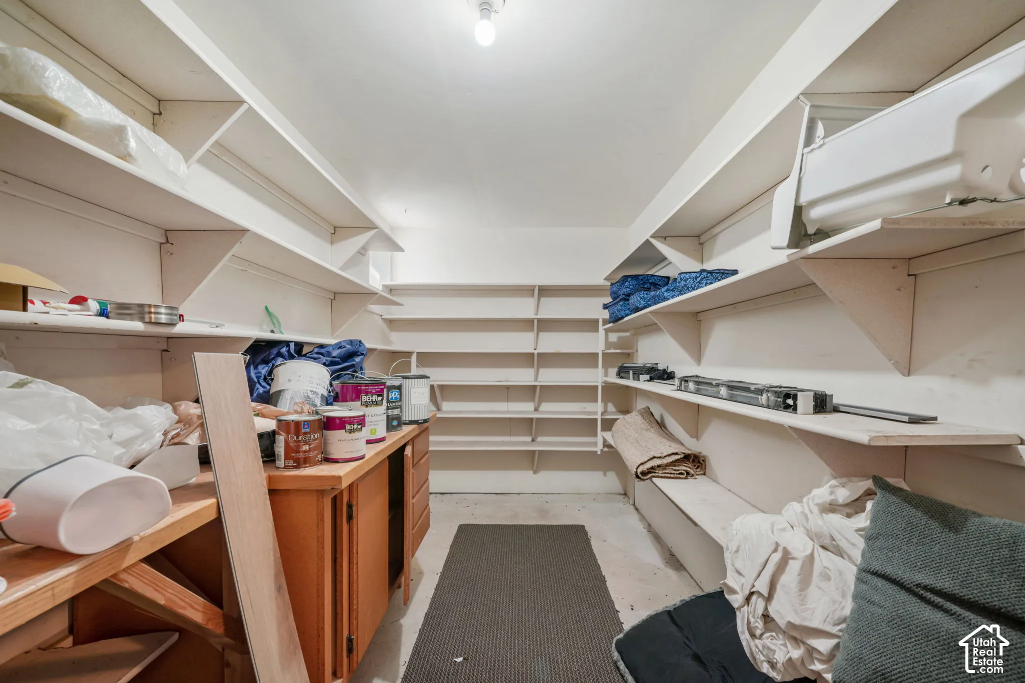 Storage at the bottom of interior stairs, accessible from both the 1st and 2nd level
