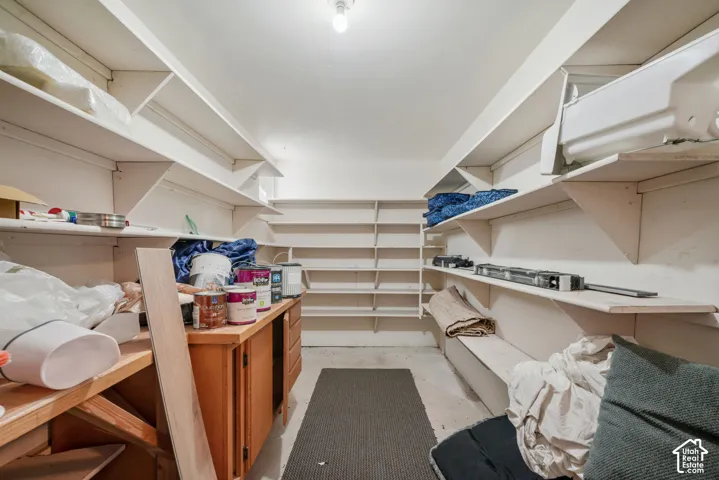 Storage at the bottom of interior stairs, accessible from both the 1st and 2nd level