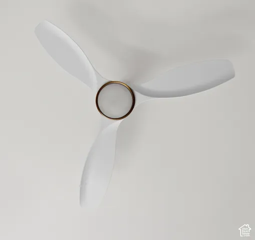 White three-blade ceiling fan featuring a gold-finish central hub and integrated lighting
