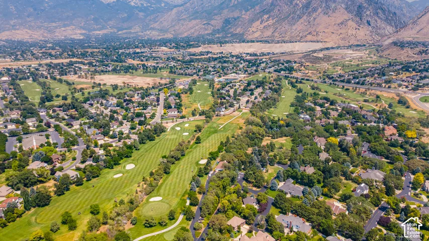Expansive golf course setting with manicured fairways