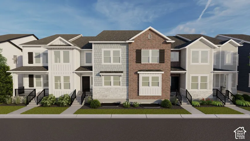 Contemporary townhome exteriors featuring varied siding materials, gabled roofs, and front entry porches with black railings