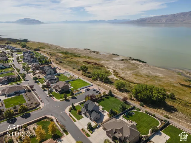 Lakefront community with mountain backdrops
