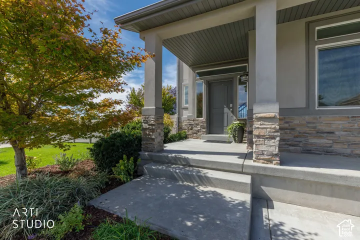 Covered entryway with stone veneer accents