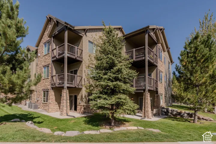 Multi-level building with stone and siding exterior