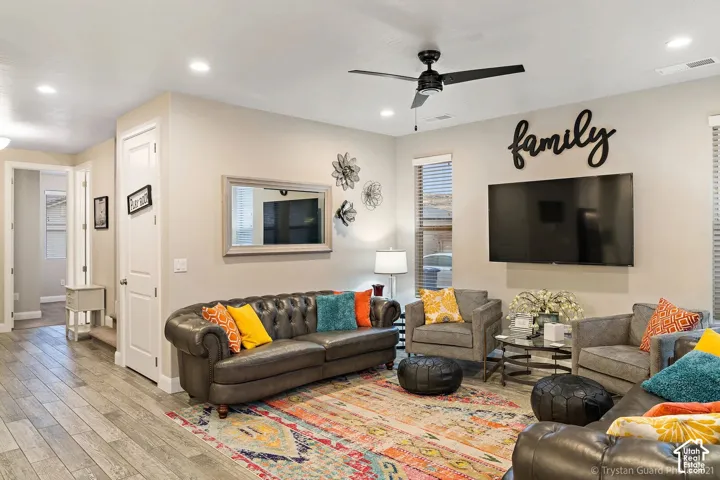 Recessed lighting, tile flooring, ceiling fan, neutral wall tones, and horizontal window blinds