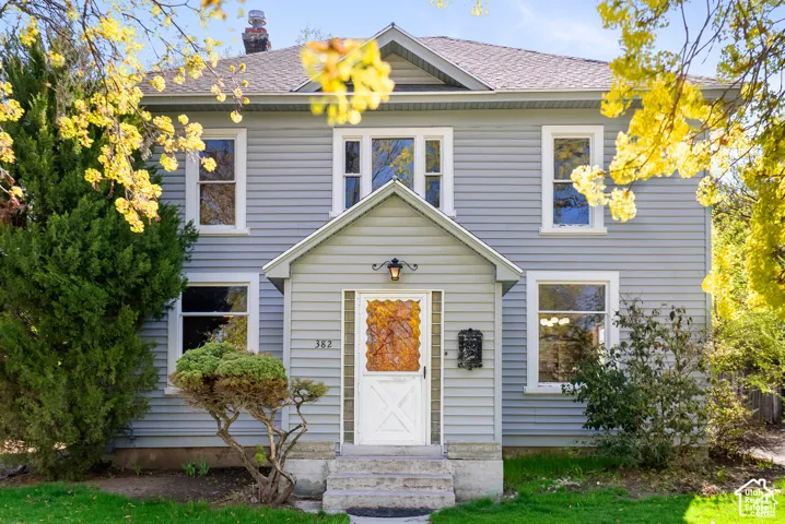 Light gray siding exterior with white trim