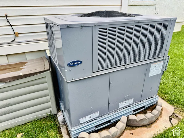 Exterior air conditioning unit on a concrete pad