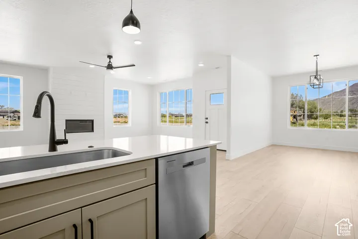 Granite Kitchen island with an undermount sink and matte black faucet
