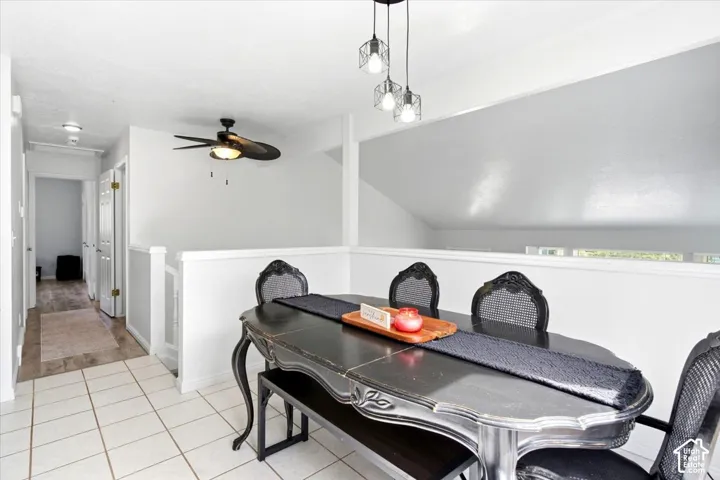 Recessed lighting, tile flooring, ceiling fan, and open railing