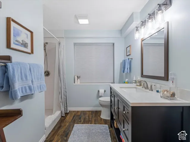 Dual vanity with undermount sinks and brushed nickel faucets