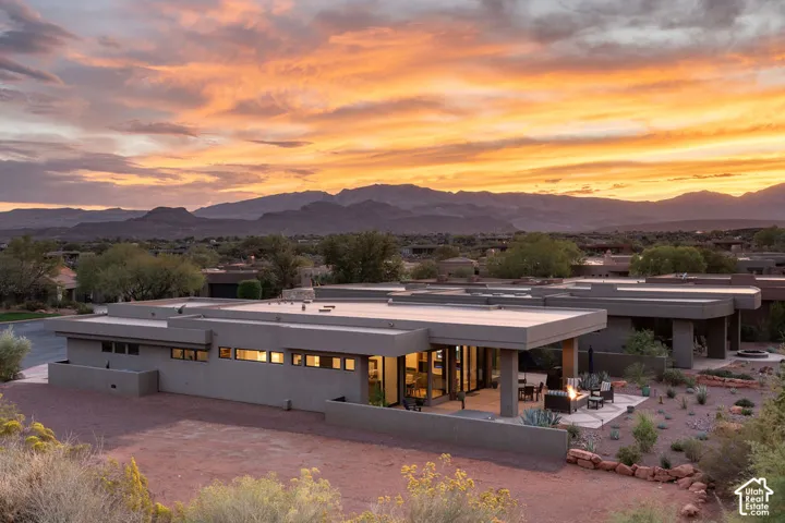 Modern architectural design featuring a flat roofline and extensive glass doors