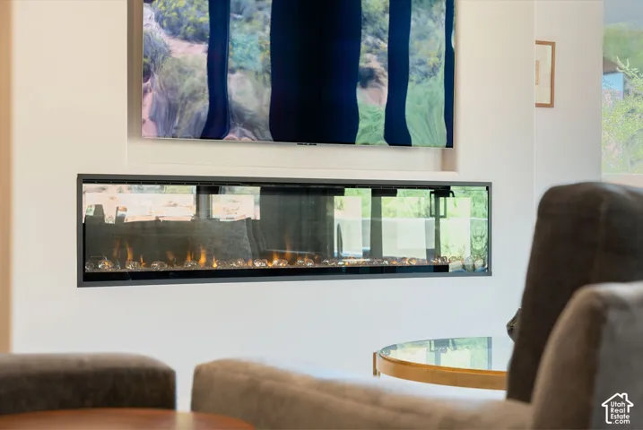 Built-in linear fireplace with glass media