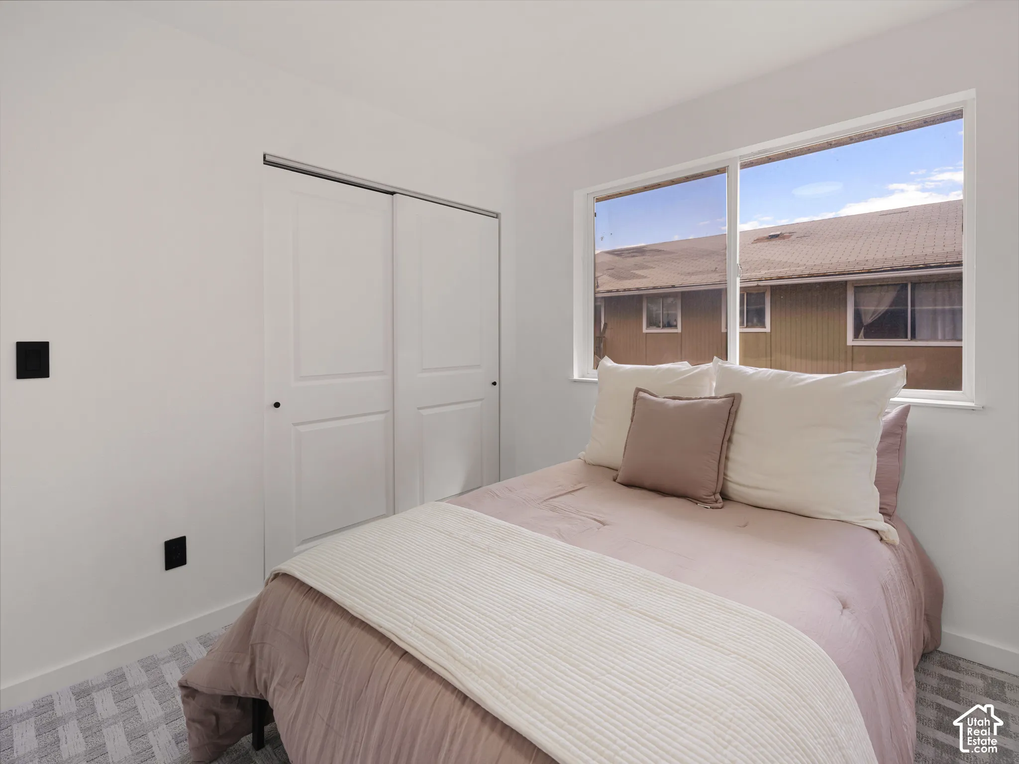 Dual sliding closet doors with black hardware