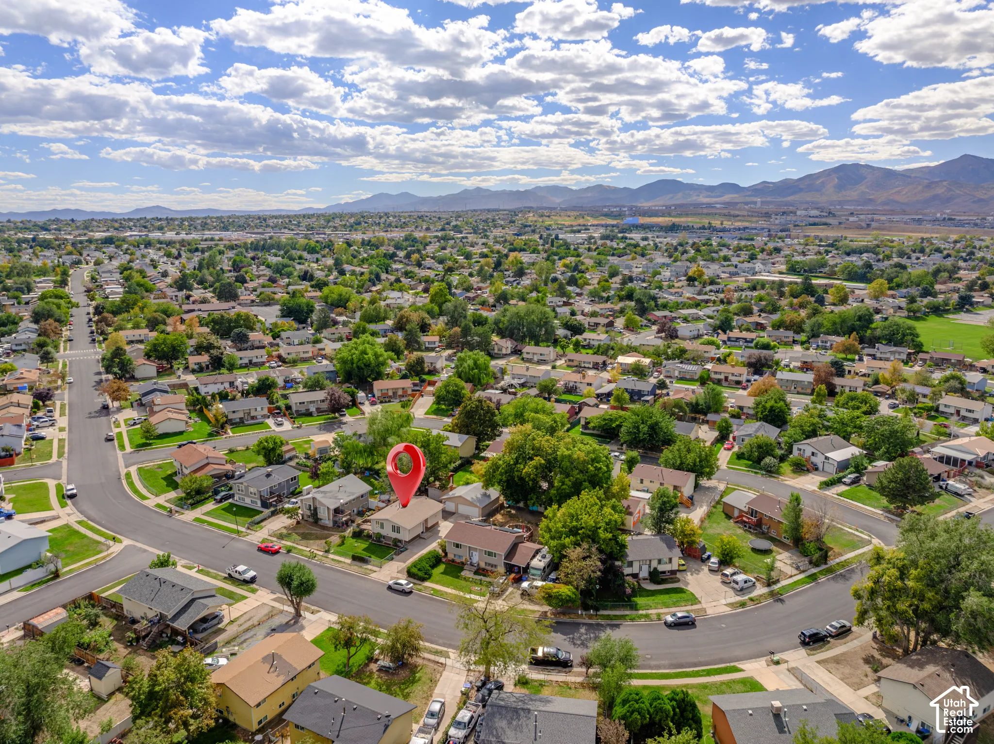 Aerial view of the home and surrounding neighborhood.