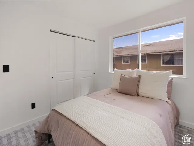 Dual sliding closet doors with black hardware