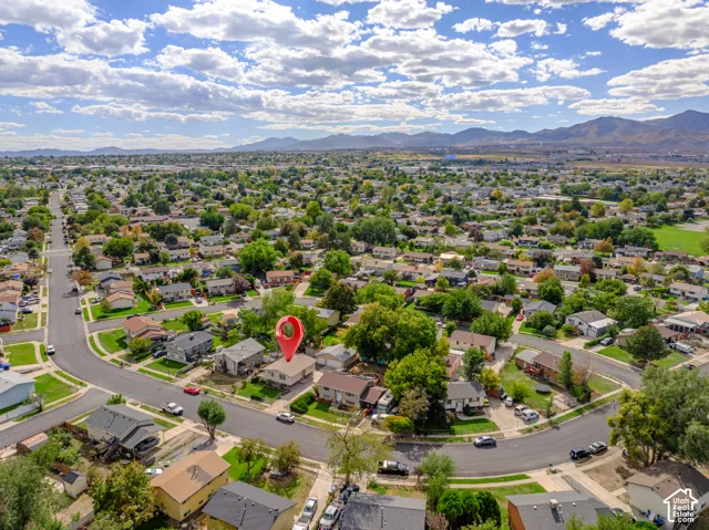 Aerial view of the home and surrounding neighborhood.