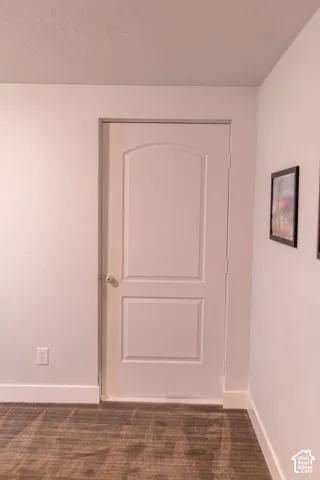White interior door with an arched panel design