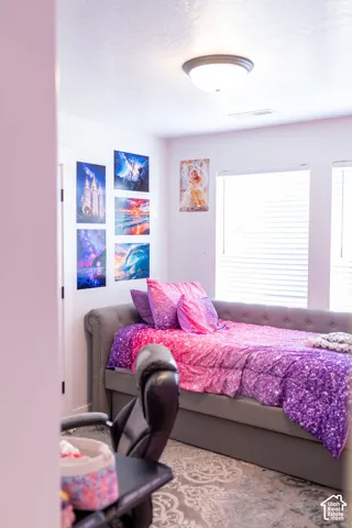 Wall-to-wall carpeting with an ornate pattern