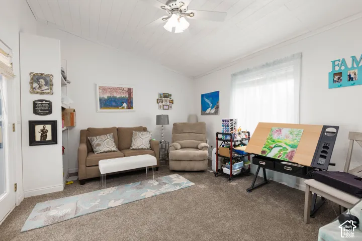 Vaulted ceiling with wood-paneled finish
