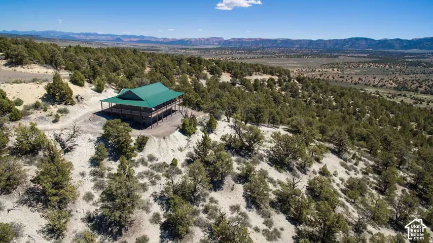 Property situated on an expansive natural landscape with abundant vegetation