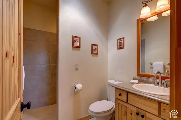 Natural wood vanity with integrated sink