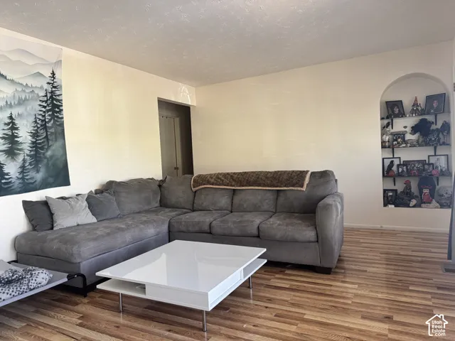 Wood-finish flooring throughout the space