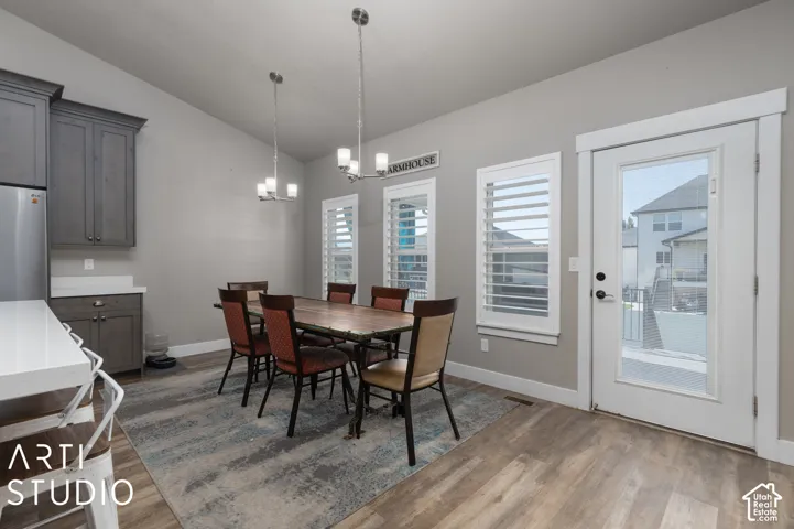 Light wood-finish flooring with grey wall paint