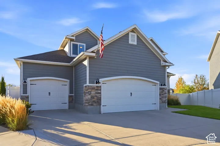 Gray siding exterior with stone accents