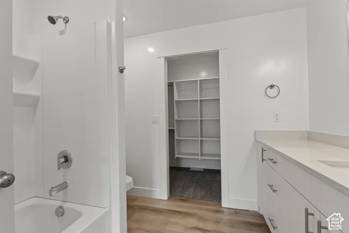 Integrated tub and shower with chrome fixtures