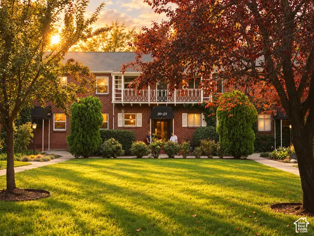 Brick exterior with white window shutters