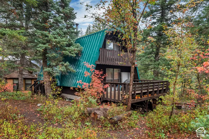 A-frame cabin with large deck.