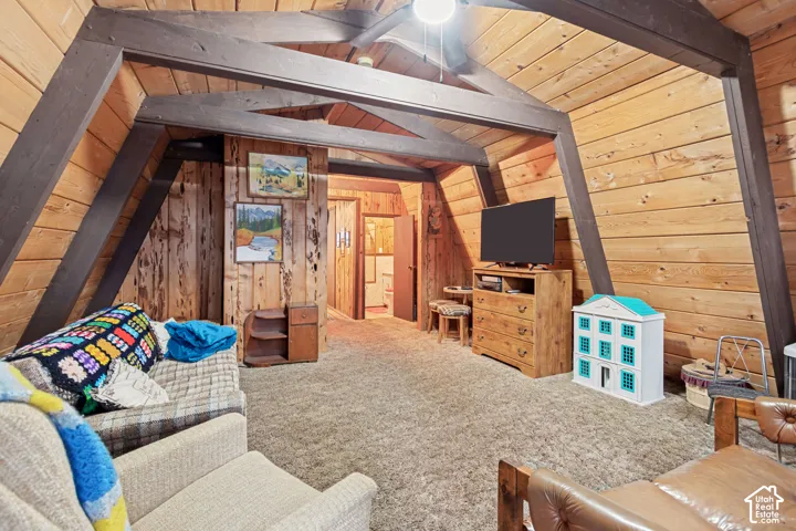 Vaulted ceiling living room area on 2nd floor.