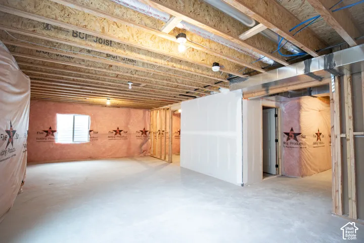 Unfinished basement with potential for large family/game room, full bathroom and one bedroom.