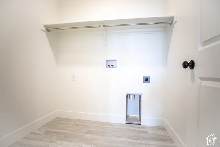 Full-size, dedicated laundry room.