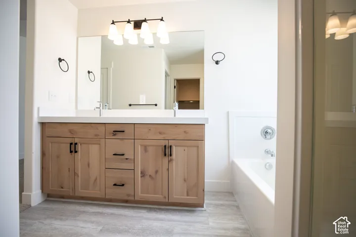 Primary bath with soaker tub and walk-in shower.