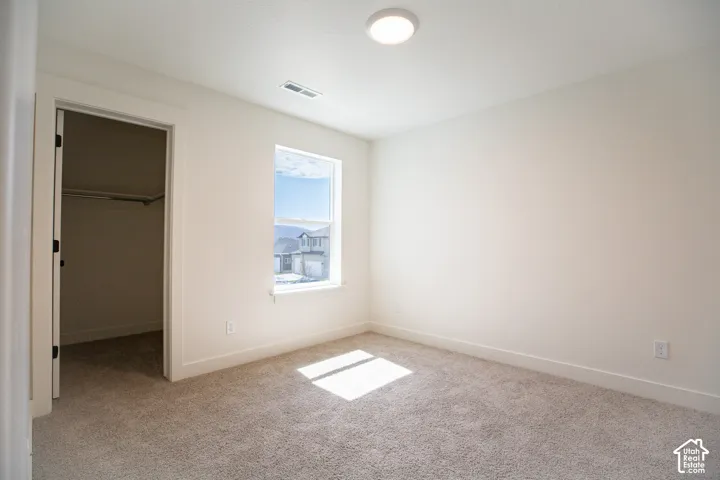 Bedroom #4 with walk-in closet.